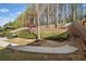 Beautiful backyard featuring a play set and stone steps leading to an upper level at 548 Lawton Bridge Sw Rd, Smyrna, GA 30082