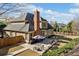 Back of house with a patio, furniture and landscaped yard at 548 Lawton Bridge Sw Rd, Smyrna, GA 30082