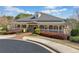 Community clubhouse with wrap around porch and beautiful landscaping at 548 Lawton Bridge Sw Rd, Smyrna, GA 30082