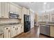 Kitchen with granite countertops, stainless steel appliances, and hardwood floors at 548 Lawton Bridge Sw Rd, Smyrna, GA 30082