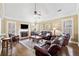 Bright living room featuring a fireplace, ceiling fan and hardwood floors at 548 Lawton Bridge Sw Rd, Smyrna, GA 30082