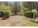 Entrance to Mockingbird Trail with natural surroundings and greenery at 548 Lawton Bridge Sw Rd, Smyrna, GA 30082