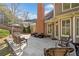 Inviting outdoor patio with stylish seating arrangements perfect for relaxing and entertaining at 548 Lawton Bridge Sw Rd, Smyrna, GA 30082