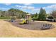 Community playground with slides, swings, benches, and landscaping at 548 Lawton Bridge Sw Rd, Smyrna, GA 30082
