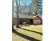 Charming single-story home featuring a stone accent garage and well-maintained front yard at 5687 Pine Meadow Ct, Morrow, GA 30260