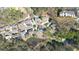 Aerial view of the property highlighting the houses, pond, and neighborhood amenities at 2376 Massey Ln, Decatur, GA 30033
