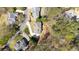 Aerial view of the property showing the house, driveway, landscaping and mature trees at 2376 Massey Ln, Decatur, GA 30033