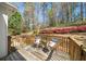 Cozy back deck with seating and beautiful landscaping at 2376 Massey Ln, Decatur, GA 30033