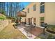Backyard featuring a patio with outdoor seating, a built-in grill, and a relaxing fountain at 2376 Massey Ln, Decatur, GA 30033