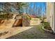 Beautiful backyard featuring tiered landscaping, wood retaining walls, and lush greenery at 2376 Massey Ln, Decatur, GA 30033