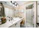 Well-lit bathroom includes a vanity, ample counter space, and a tub/shower combo at 2376 Massey Ln, Decatur, GA 30033