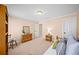 Neutral bedroom featuring a cozy daybed, two dressers, and an interior access door at 2376 Massey Ln, Decatur, GA 30033