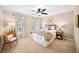 Serene bedroom with neutral tones, large windows, and comfortable furnishings at 2376 Massey Ln, Decatur, GA 30033