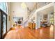Spacious foyer with a staircase, hardwood floors, and a view of the living room at 2376 Massey Ln, Decatur, GA 30033