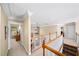 Bright hallway with staircase and view into living room at 2376 Massey Ln, Decatur, GA 30033