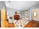 Cozy living room with hardwood floors, built-in bookshelves, and neutral color palette at 2376 Massey Ln, Decatur, GA 30033
