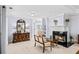 Comfortable main bedroom with fireplace, dresser, and cozy sitting area at 2376 Massey Ln, Decatur, GA 30033