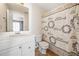 Cozy bathroom with a shower and tub, featuring a modern vanity and ample lighting at 258 Venture Path, Hiram, GA 30141