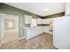 Charming kitchen featuring ample counter space and views into the living area at 258 Venture Path, Hiram, GA 30141