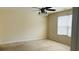 This empty bedroom is well-lit and has a ceiling fan and a window, great for a new home owner at 5204 Waldrop, Decatur, GA 30034
