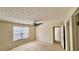 Neutral bedroom featuring standard size window and ceiling fan at 5204 Waldrop, Decatur, GA 30034