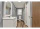 Bathroom with a white vanity, toilet, and shower-tub combination at 528 Lower Scott Mill Rd, Canton, GA 30114