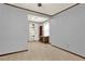 Inviting room that can double as a home office with natural light and neutral carpet at 528 Lower Scott Mill Rd, Canton, GA 30114