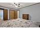 Comfortable bedroom featuring an ensuite bathroom, spacious closet, and soft carpet flooring at 528 Lower Scott Mill Rd, Canton, GA 30114