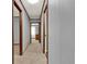 Hallway with neutral carpet leading to various rooms in the home at 528 Lower Scott Mill Rd, Canton, GA 30114