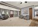 Spacious living room with comfortable seating, and a light color palette, ideal for hosting at 528 Lower Scott Mill Rd, Canton, GA 30114