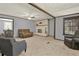 Inviting living room with neutral tones, fireplace, and open layout, perfect for relaxation at 528 Lower Scott Mill Rd, Canton, GA 30114