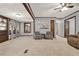 Large living room with a lovely art piece, seating and a light color palette, perfect for relaxation at 528 Lower Scott Mill Rd, Canton, GA 30114