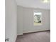 Neutral bedroom with a carpet and a view from the window at 822 Pine Way, Dallas, GA 30157
