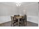 Traditional dining room features a spacious table and classic decor elements, great for hosting at 822 Pine Way, Dallas, GA 30157