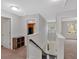 Upstairs hallway offering access to various rooms and a glimpse of the staircase and front door at 822 Pine Way, Dallas, GA 30157