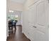 Bright hallway leads to the dining room, showcasing the home's open and inviting layout at 822 Pine Way, Dallas, GA 30157
