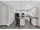 Stylish kitchen with stainless steel appliances, granite countertops, and a breakfast bar at 822 Pine Way, Dallas, GA 30157