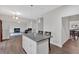 Open kitchen area with island, great for modern living and entertaining Gathering and guests at 822 Pine Way, Dallas, GA 30157