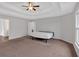 Spacious bedroom with trey ceiling, carpet flooring and a ceiling fan at 822 Pine Way, Dallas, GA 30157