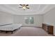 Spacious bedroom featuring large windows, a dresser and trey ceiling at 822 Pine Way, Dallas, GA 30157