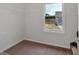 Bright walk-in closet features carpet flooring, white walls and metal shelving, offering ample storage space at 822 Pine Way, Dallas, GA 30157