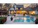 Beautiful pool area, enhanced by lush landscaping, spa, and elegant patio furniture at 5495 Mount Vernon Pkwy, Atlanta, GA 30327