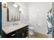 Chic powder room featuring modern fixtures, white subway tile, and elegant decor creates a stylish and functional space at 5495 Mount Vernon Pkwy, Atlanta, GA 30327