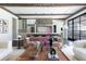 Bright open concept living room features hardwood floors and easy access to the chef's kitchen at 5495 Mount Vernon Pkwy, Atlanta, GA 30327