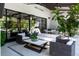 Relaxing outdoor living area with comfortable seating, stylish décor, and a seamless connection to the home at 5495 Mount Vernon Pkwy, Atlanta, GA 30327