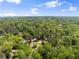 Breathtaking aerial view showcasing the lush, green landscape and homes nestled among the trees at 110 Myers Dr, Alpharetta, GA 30009