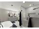 Bathroom showcases a double vanity, bathtub, and a glass enclosed shower at 110 Myers Dr, Alpharetta, GA 30009