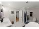 Bathroom with a dual vanity, a glass-enclosed shower, and a freestanding bathtub at 110 Myers Dr, Alpharetta, GA 30009