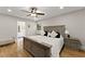 Spacious bedroom with a king bed, a window, and an ensuite bathroom at 110 Myers Dr, Alpharetta, GA 30009