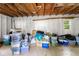 Spacious garage with exposed rafters offers versatile storage and project space at 110 Myers Dr, Alpharetta, GA 30009